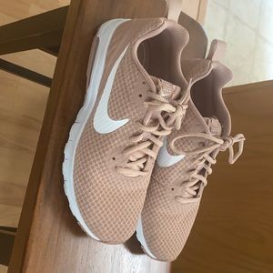 Light pink Nike tennis shoes! Worn a couple times